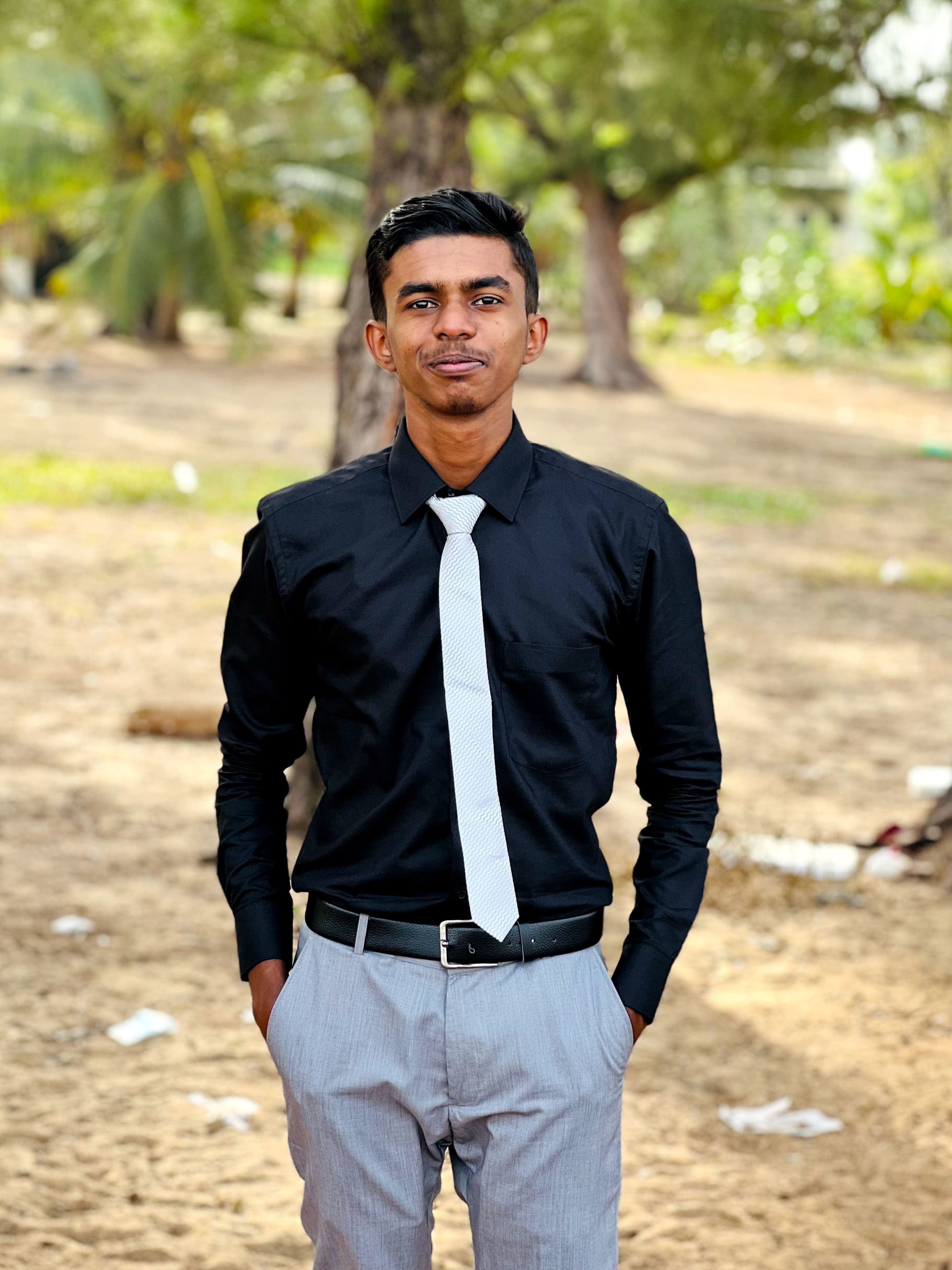 Portrait of Puvanakopis Mehanathan